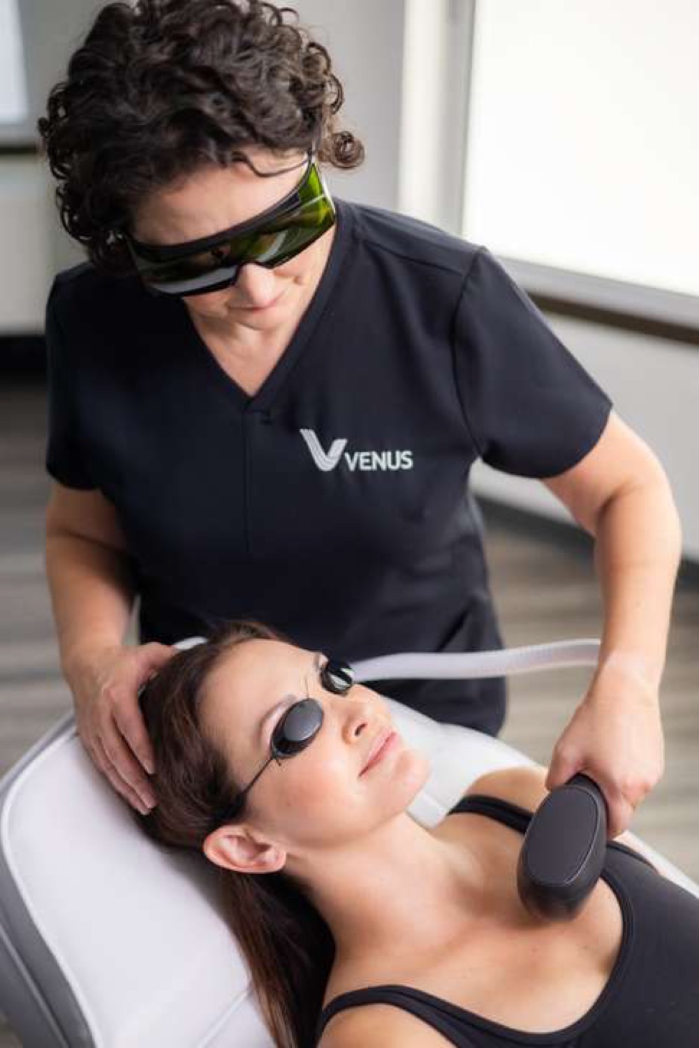 Venus manufacturer photograph of a light-based treatment on the upper chest